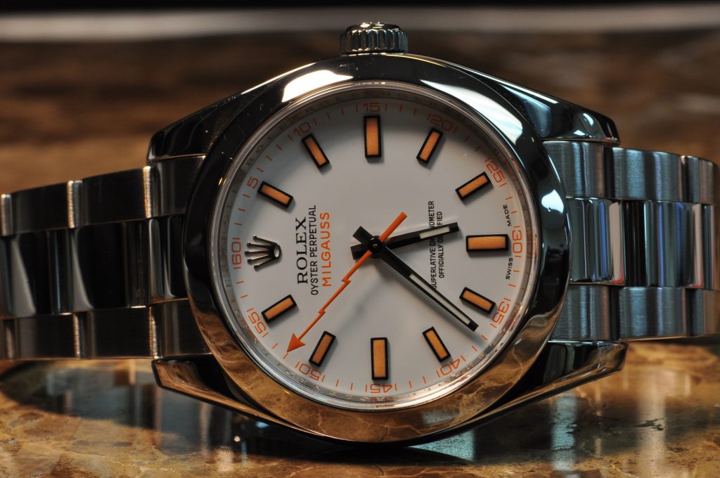 The 40mm replica watch has a white dial.